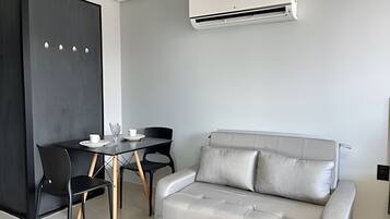 Apartamento superior | Área de estar