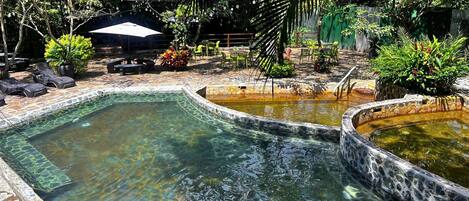 Honeymoon Room, 1 King Bed, Garden View, Garden Area | Pool | 11 outdoor pools, pool umbrellas