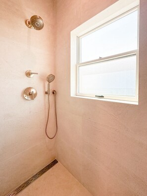 Shower, towels, soap, toilet paper