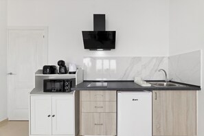 Microwave, stovetop, coffee/tea maker, toaster