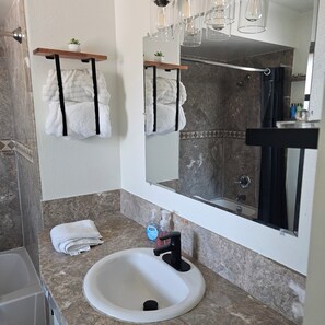 Hair dryer, towels, soap, toilet paper