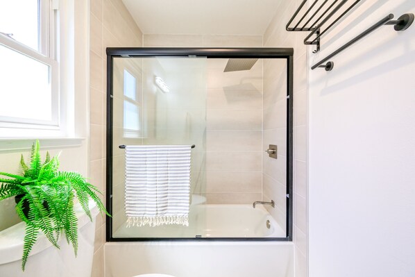 Shower, hair dryer, towels, soap