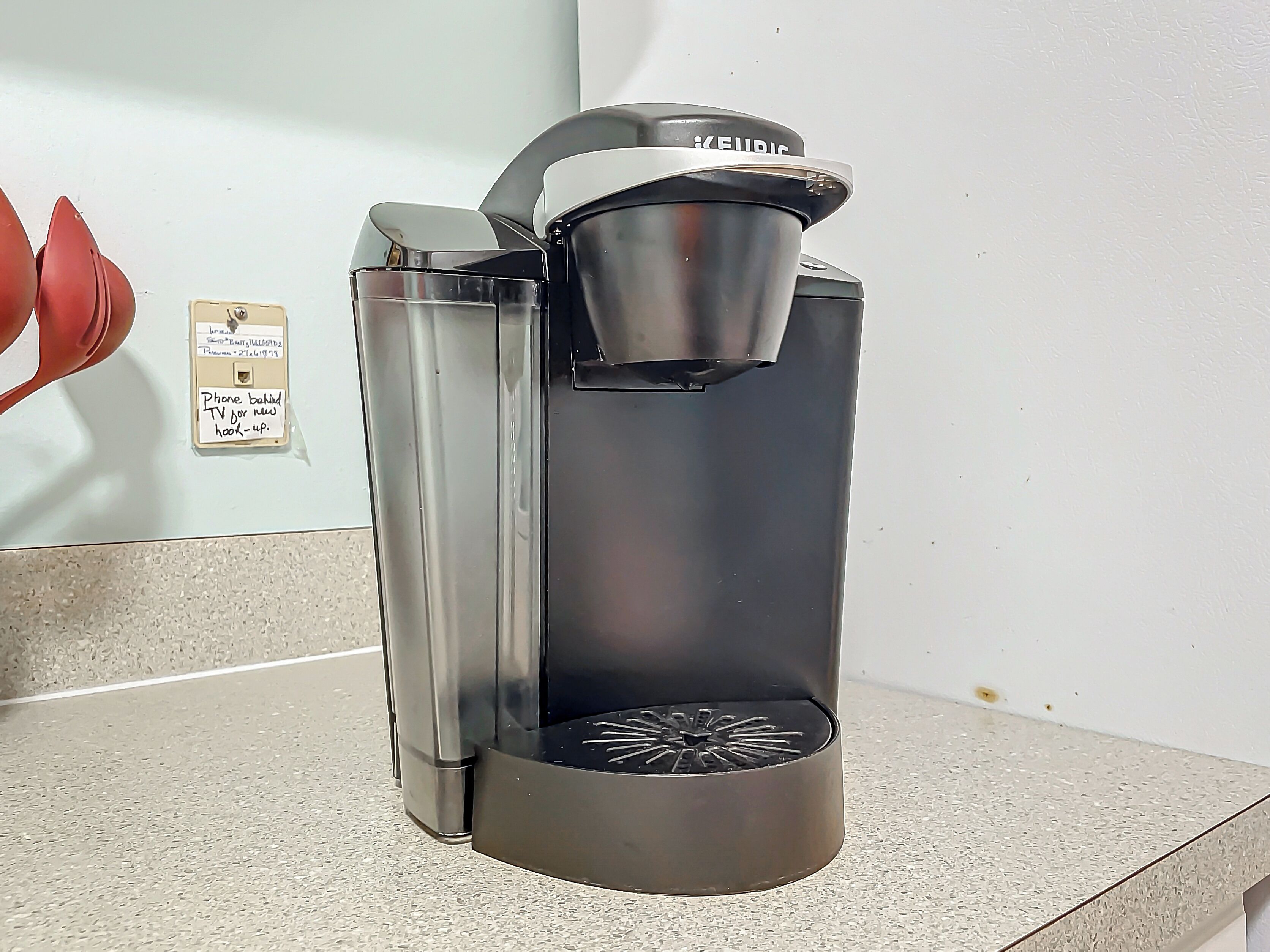 A Keurig coffee maker on a countertop.