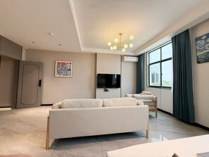 Business Single Room, 1 King Bed, City View | Living area | Computer monitors, printers