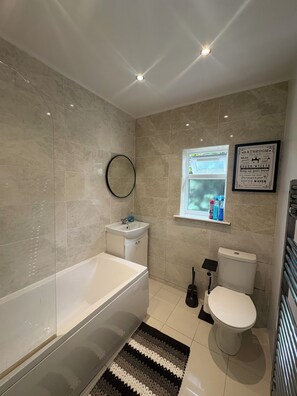 Hair dryer, towels, soap, toilet paper