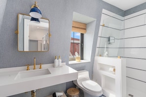 Shower, free toiletries, hair dryer, towels