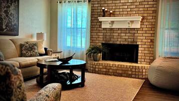 TV, fireplace, books, offices