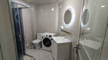 Hair dryer, towels, soap, toilet paper