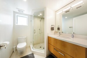 Hair dryer, towels, soap, shampoo