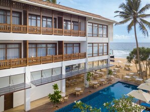 Outdoor pool, open 9:00 AM to 9:00 PM, pool umbrellas, sun loungers