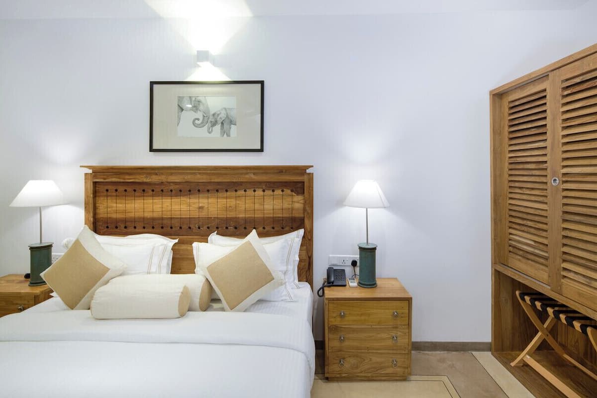 Deluxe Double Room, Balcony, Partial Sea View | Egyptian cotton sheets, premium bedding, minibar, in-room safe