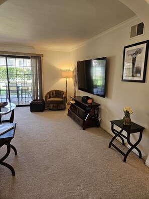 TV, books - Resort Style Living at Mesquite Country Club (Palm Springs)