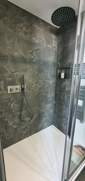 Shower, hair dryer, towels, soap