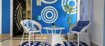 11th Nest ~ A Santorini home,1bhk with AC