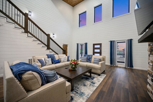 Smart TV, fireplace, table football, books