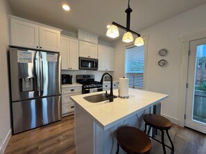 Fridge, microwave, oven, stovetop - Luxury Olivia Beach Retreat • Sleeps 10 • Hot Tub, Game Room & Pet Friendly (Lincoln City)