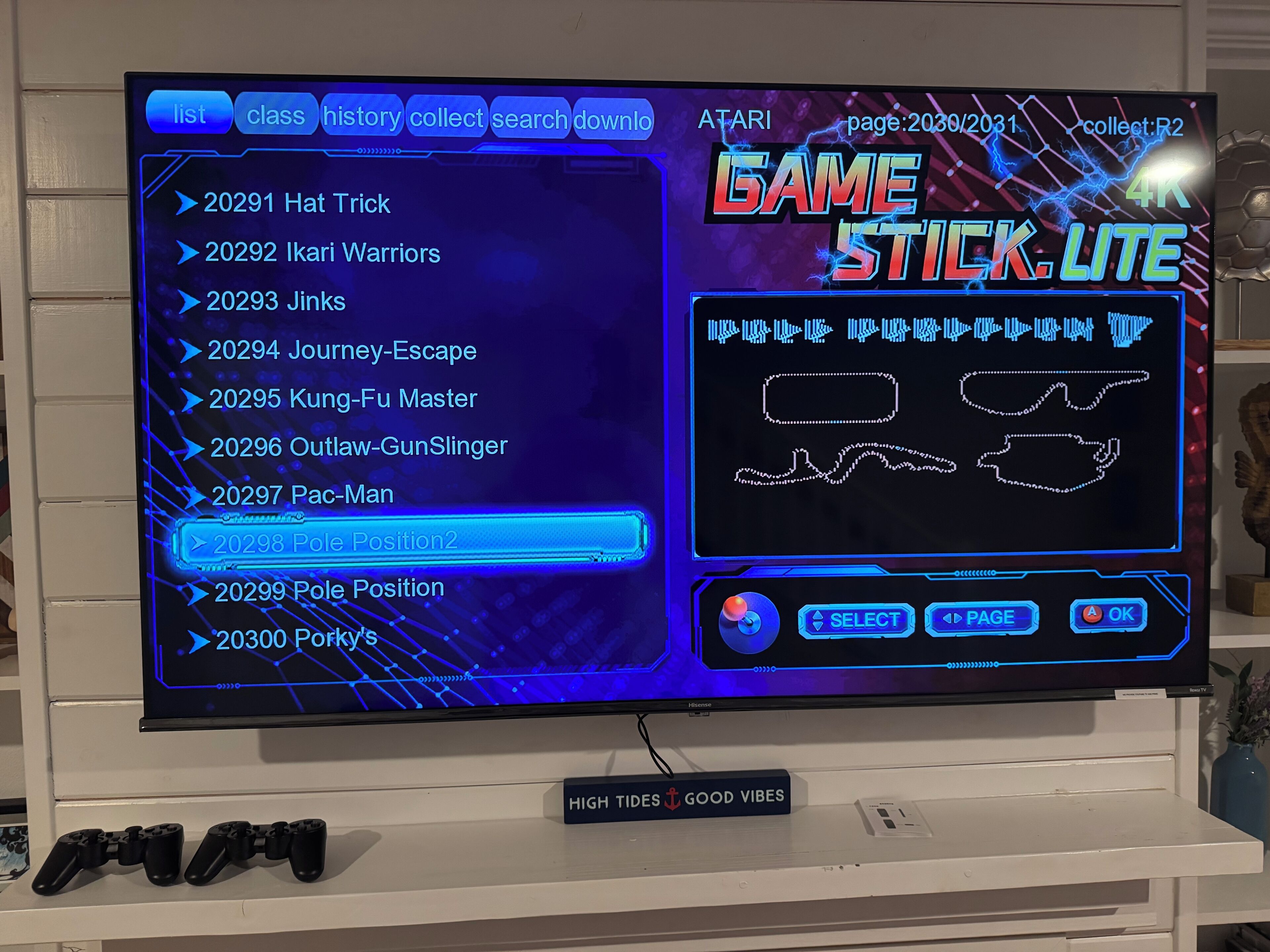 A video game console with a screen displaying a game menu.