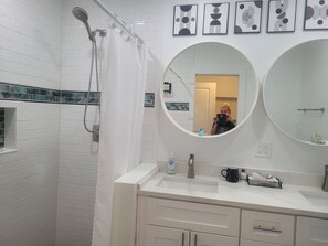 Shower, hair dryer, towels, soap