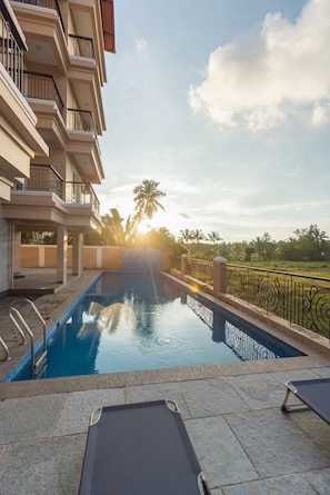 Outdoor pool, sun loungers