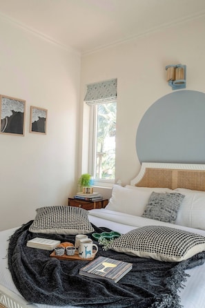 Premium bedding, blackout drapes, iron/ironing board, free WiFi