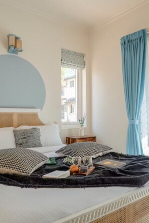 Premium bedding, blackout curtains, iron/ironing board