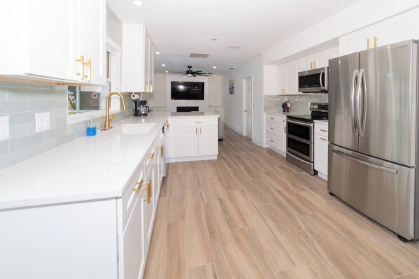 Microwave, oven, stovetop, dishwasher - Spacious 2-Story Home with Private Pool & River Access (Port St. Lucie)