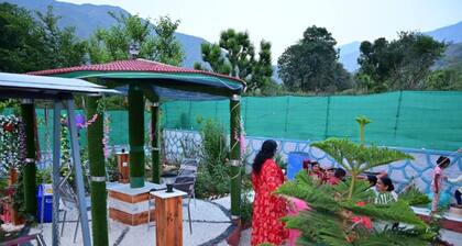 Peaceful stay : 2-bedroom, bright living area, kitchen, terrace, and garden