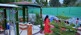 Peaceful stay : 2-bedroom, bright living area, kitchen, terrace, and garden