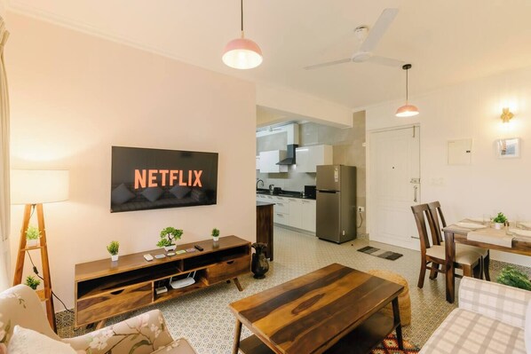 50-inch Smart TV with digital channels, books