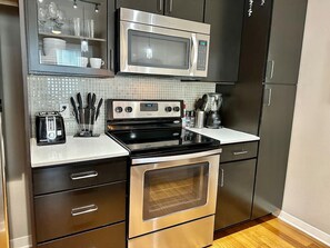 Fridge, microwave, oven, stovetop