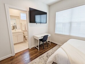 3 bedrooms, desk, iron/ironing board, travel cot