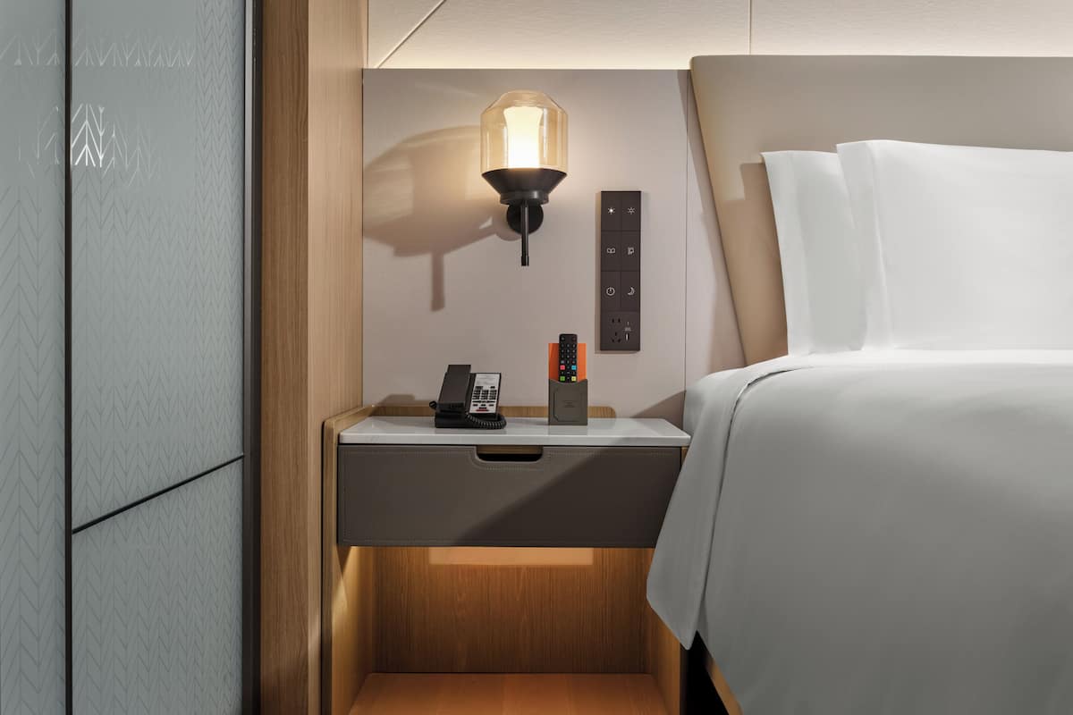 Literie de qualité, lit avec matelas Select Comfort, minibar, bureau