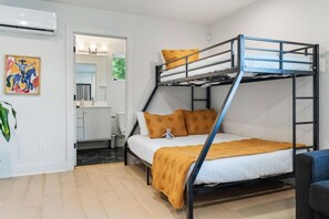 1 bedroom, desk, iron/ironing board, travel cot