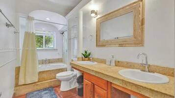 Shower, towels, soap, toilet paper