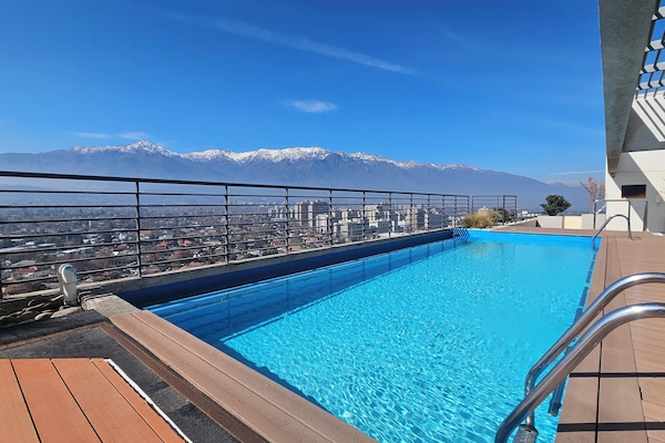 Seasonal outdoor pool, open 8:30 AM to 8:30 PM, pool umbrellas