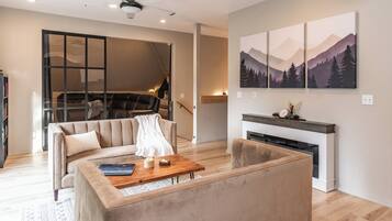 Smart TV, fireplace, foosball, books