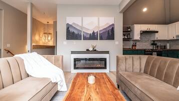 Smart TV, fireplace, foosball, books