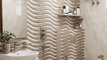 Deluxe Quadruple Room, City View | Bathroom | Shower, slippers, towels, soap