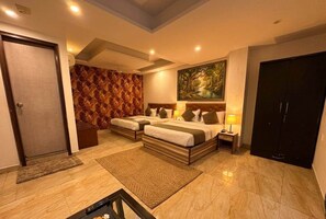 Deluxe Quadruple Room, City View | In-room safe, desk, laptop workspace, soundproofing - Hotel The Best Delhi Airport (New Delhi)