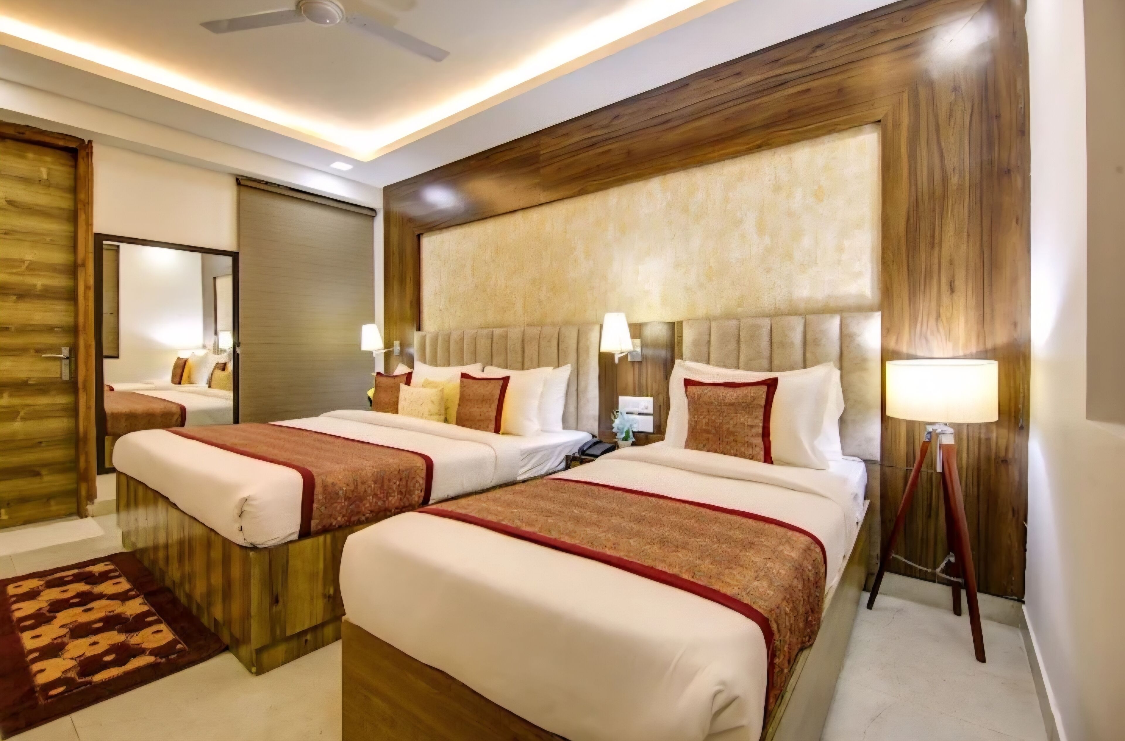 Deluxe Quadruple Room, City View | In-room safe, desk, laptop workspace, soundproofing