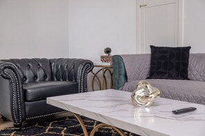 House (1 Bedroom) | Living area | 50-inch TV with digital channels - Stylish Stay With Unforgettable Downtown Views! (San Antonio)