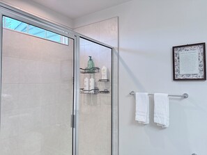 Shower, hair dryer, towels, soap
