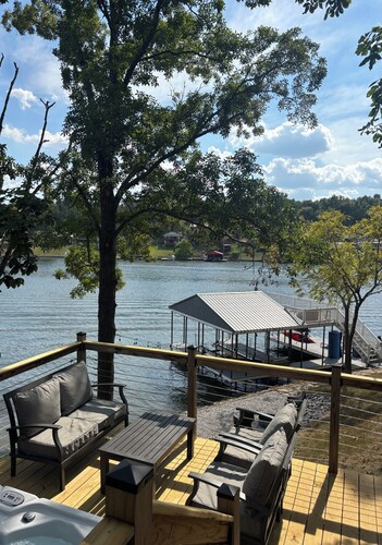 3-bedroom modern mid century cabin! 
Hot tub, fire pit and lake front