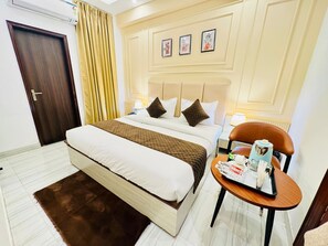 Deluxe Double or Twin Room, City View | In-room safe, desk, laptop workspace, soundproofing