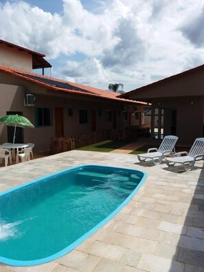 Outdoor pool, pool umbrellas, pool loungers