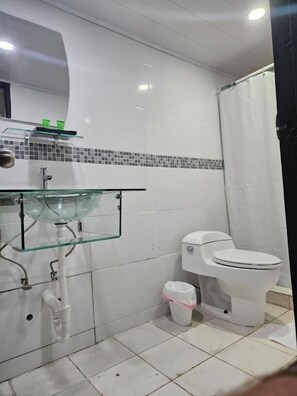 Shower, towels, soap, shampoo