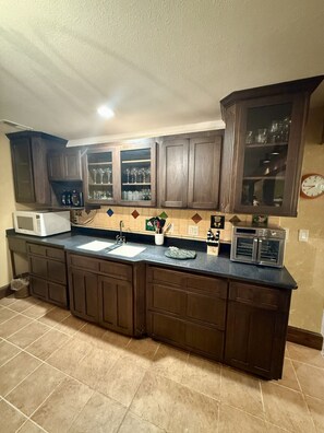 Fridge, microwave, coffee/tea maker, toaster