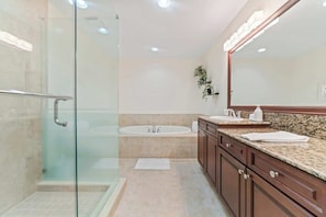 Shower, hair dryer, towels, shampoo