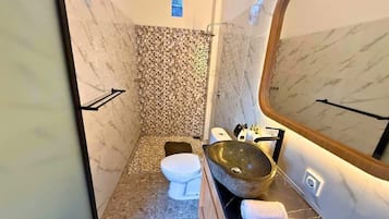 Shower, towels, soap, shampoo