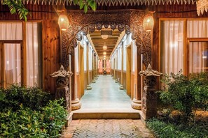 Classic Twin Room, Non Smoking, Courtyard View | Lanai - Zhaizili Resort Xishuangbanna  (Xishuangbanna Dai)